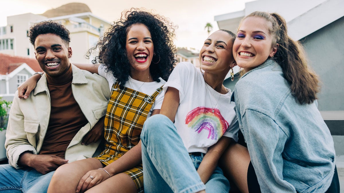 Friends having fun together on a rooftop