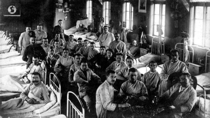 Verwundete Männer in Kriegslazarett